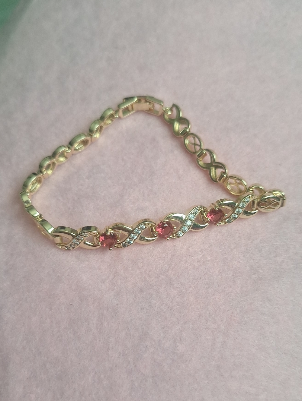 Gold Tone Bracelet with Pink Stones and Crystal Accents